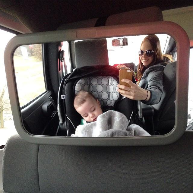 Noah and his mother in a care with a mirror to see the back seat